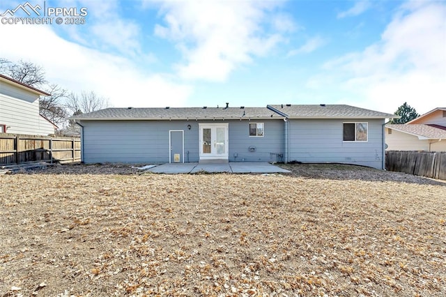 back of property featuring a patio and french doors