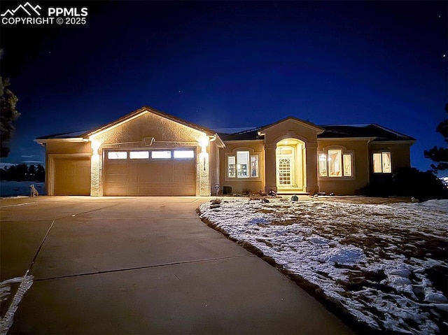 view of front of home featuring a garage