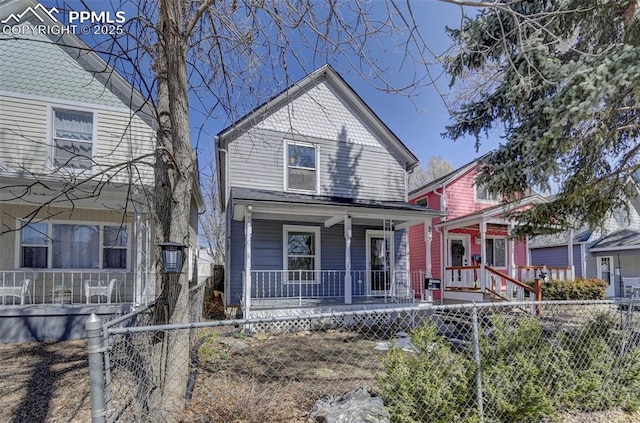 front of property featuring covered porch