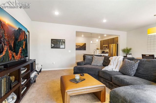 living room with light colored carpet