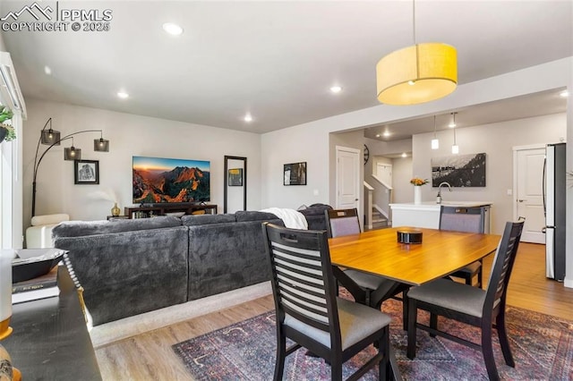 dining area with light wood-type flooring