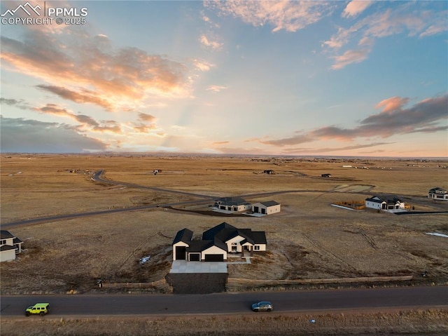 aerial view at dusk with a rural view