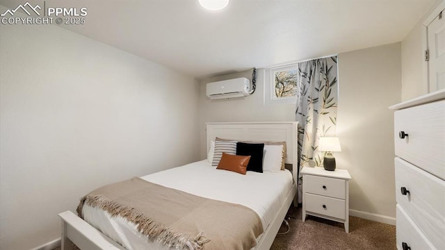 carpeted bedroom featuring baseboards and a wall mounted AC