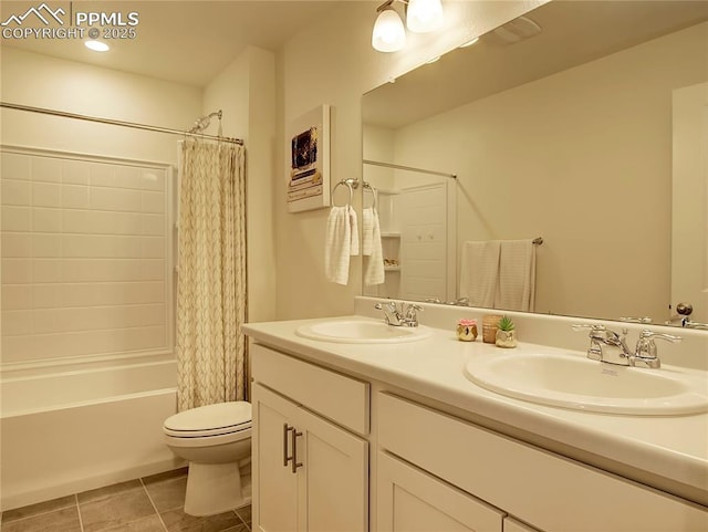 full bathroom featuring tile patterned floors, vanity, toilet, and shower / bathtub combination with curtain