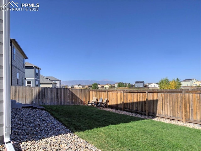 view of yard with a mountain view