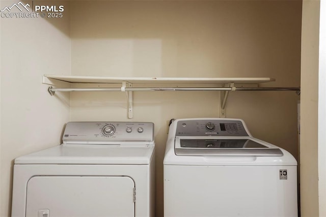 laundry room with washer and dryer