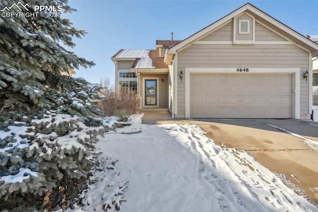 view of front of property featuring a garage