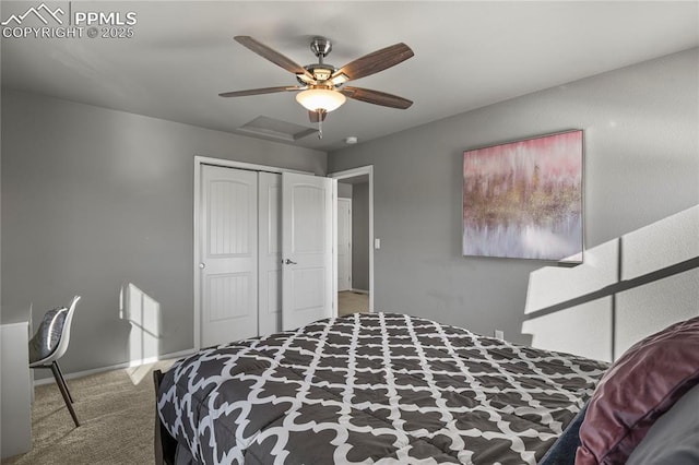 carpeted bedroom featuring ceiling fan and a closet