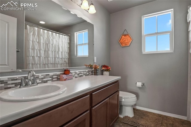 bathroom with toilet, vanity, backsplash, and a shower with shower curtain