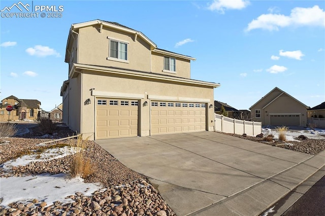 view of front of house with a garage