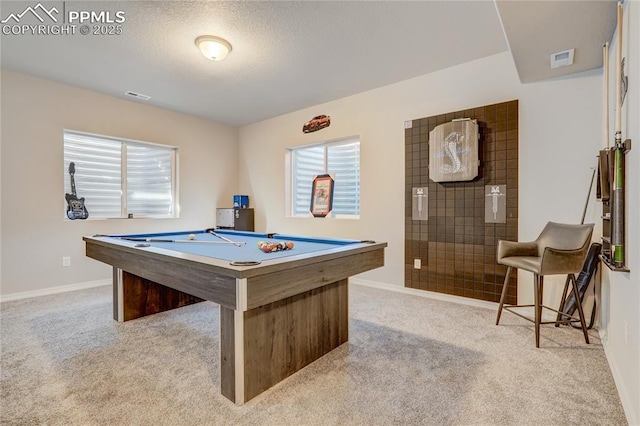 recreation room with light carpet and pool table