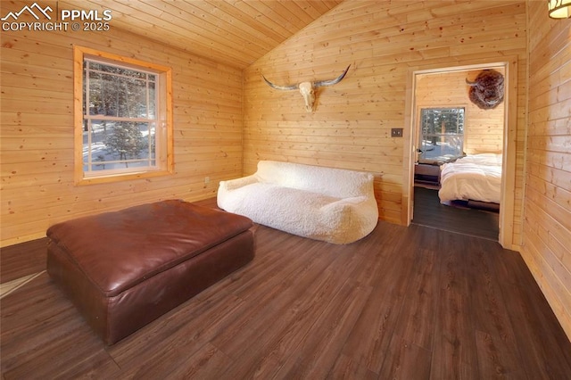 living area featuring hardwood / wood-style floors, wood walls, wooden ceiling, and vaulted ceiling