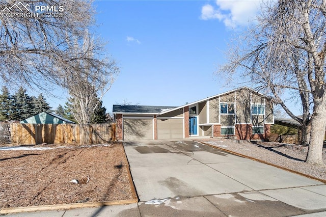 ranch-style house featuring a garage