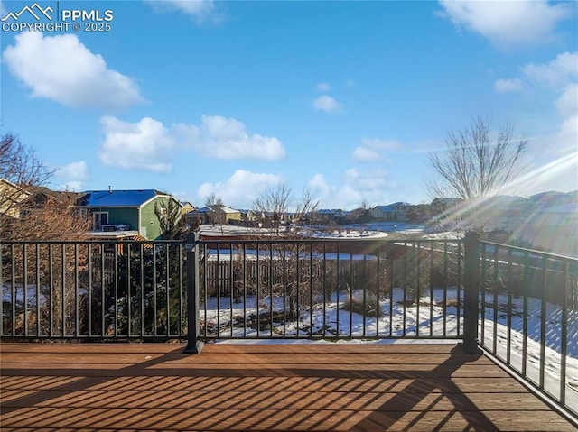 7707 Orange Sunset Dr, Colorado Springs, CO 80922 - view of snow covered deck