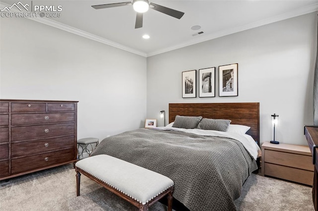 bedroom featuring ceiling fan, ornamental molding, and light colored carpet