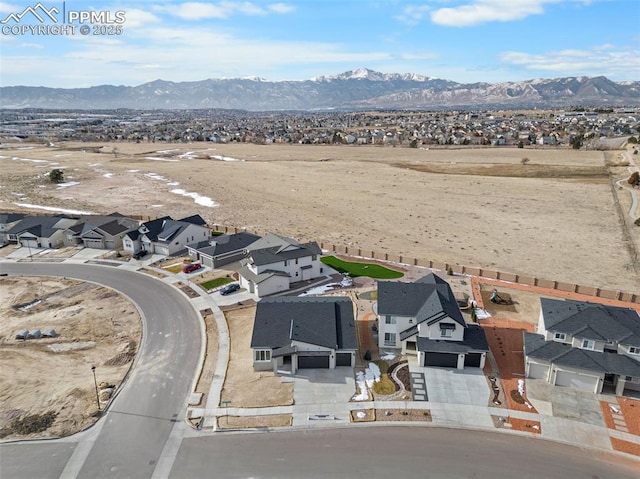 bird's eye view with a mountain view