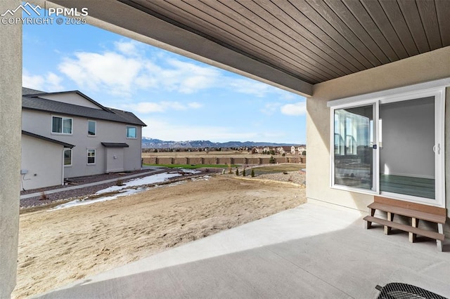 view of patio with a mountain view