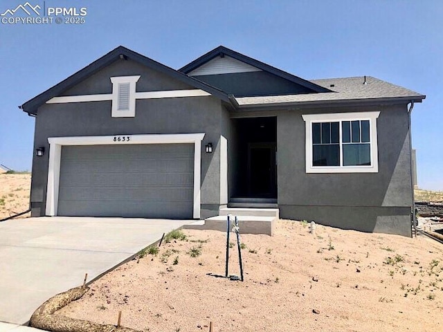 view of front of home with a garage