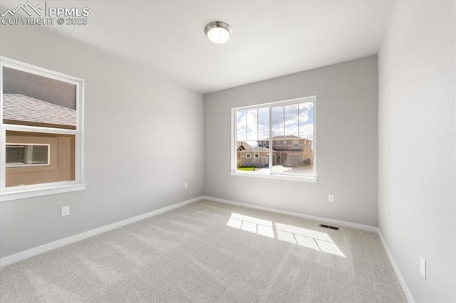 unfurnished room featuring carpet flooring and cooling unit