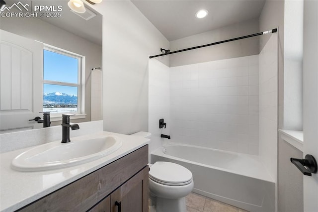 full bathroom with tile patterned floors, vanity, toilet, and tub / shower combination