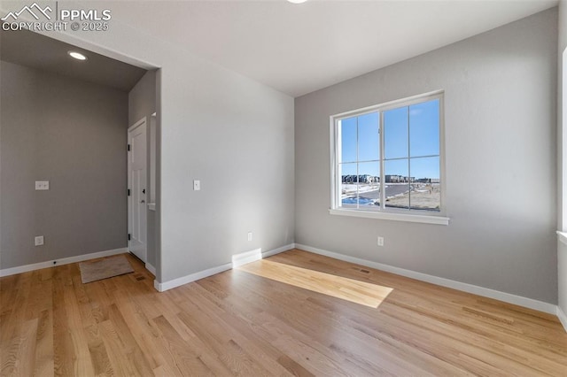 empty room featuring light hardwood / wood-style floors