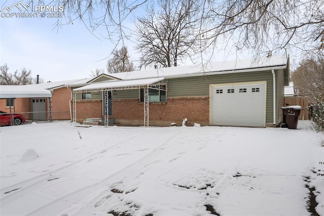 ranch-style home featuring a garage