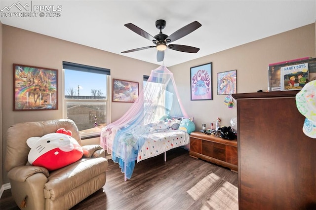 bedroom featuring ceiling fan and wood-type flooring