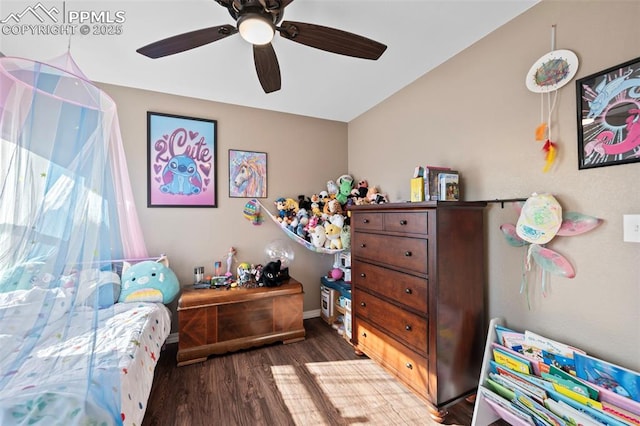 bedroom featuring dark wood-type flooring and ceiling fan