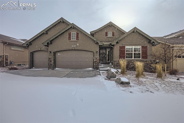 view of front of property with a garage