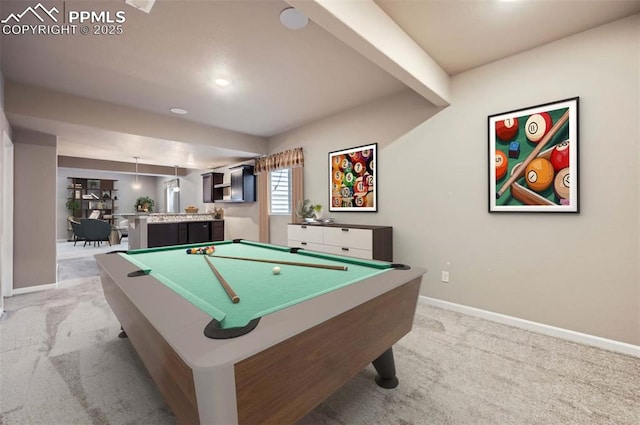 game room featuring pool table, light carpet, and beamed ceiling