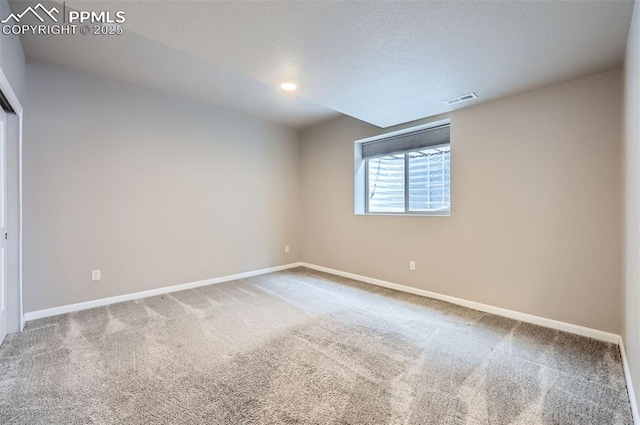 view of carpeted spare room