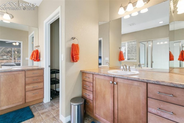 bathroom featuring vanity and walk in shower