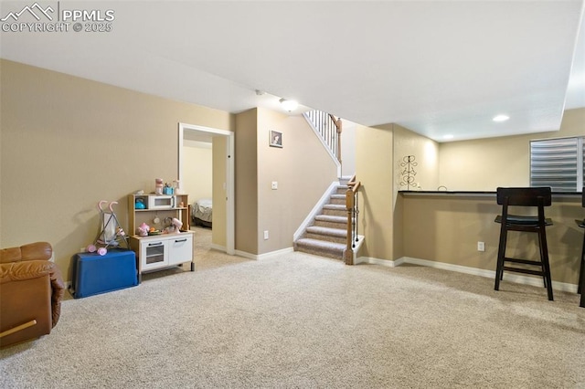 basement with light colored carpet