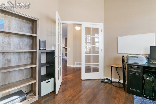 office featuring dark hardwood / wood-style flooring and french doors