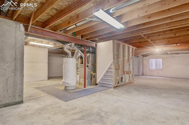 basement with heating unit and water heater