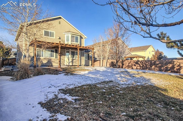 view of snow covered property