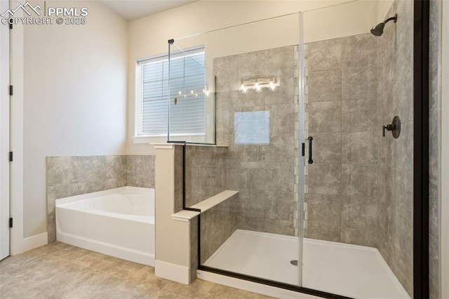 bathroom featuring shower with separate bathtub and tile patterned floors