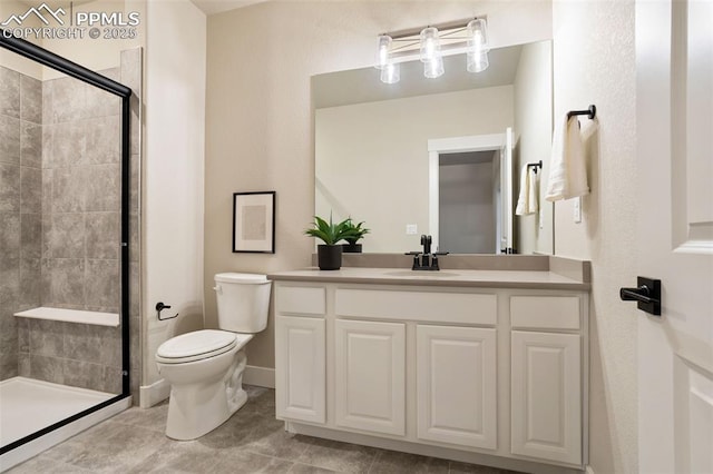 bathroom with walk in shower, vanity, and toilet