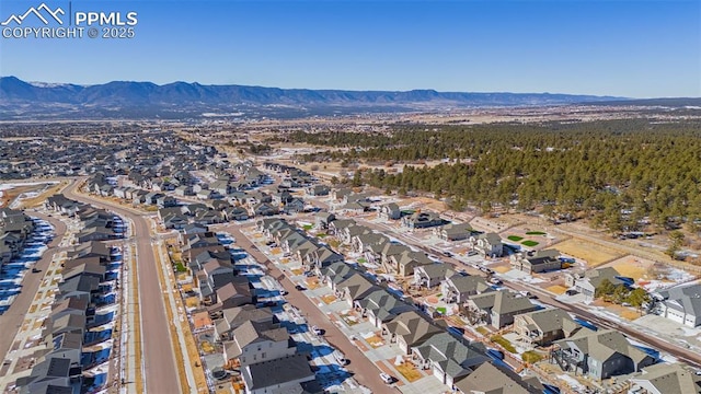 bird's eye view with a mountain view