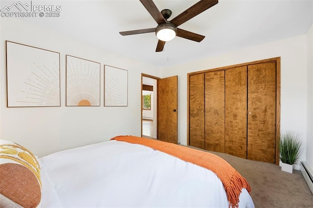 carpeted bedroom featuring ceiling fan and a baseboard heating unit