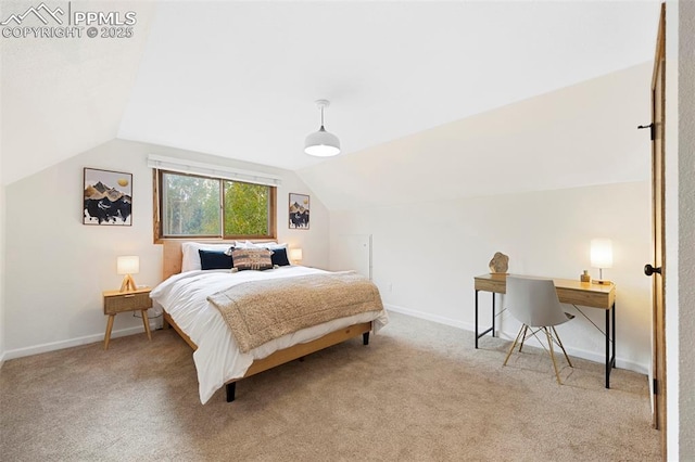 carpeted bedroom featuring vaulted ceiling