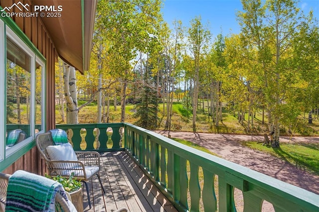 wooden balcony with a wooden deck