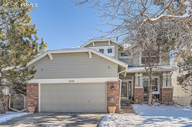 view of front of property with a garage