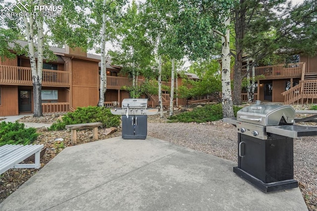 view of patio featuring a grill