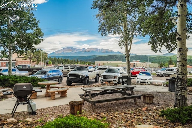 exterior space with a grill and a mountain view