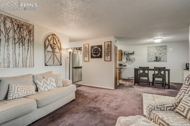 living room featuring carpet flooring and a textured ceiling