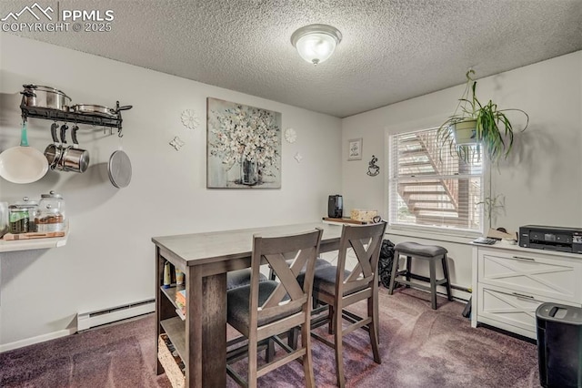 dining space with dark colored carpet, a textured ceiling, and a baseboard heating unit