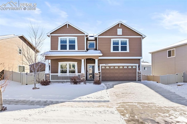 craftsman-style home with a porch and a garage