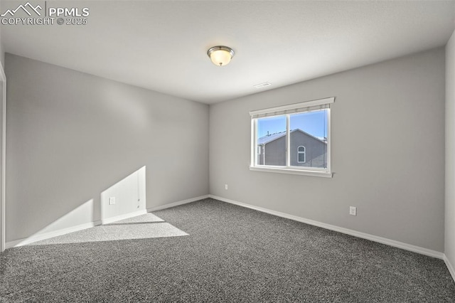 view of carpeted spare room