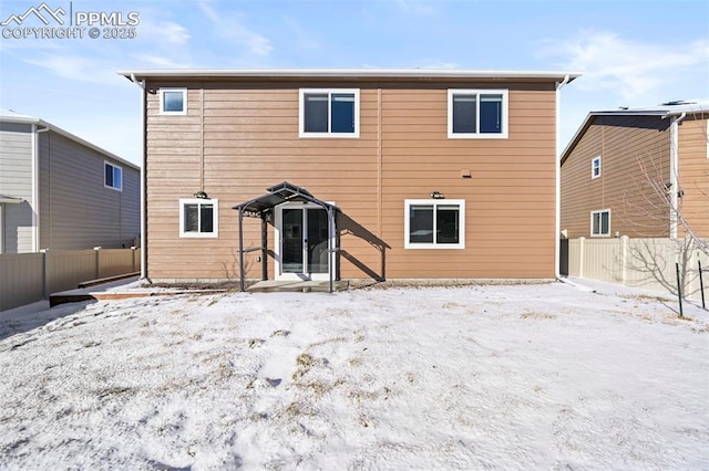 view of snow covered property